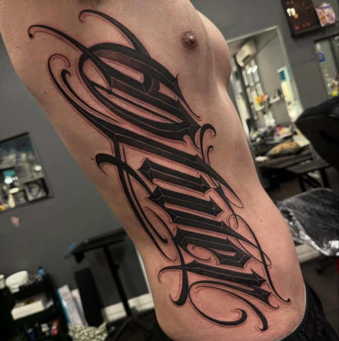Bold Blackwork Script for the Ribs