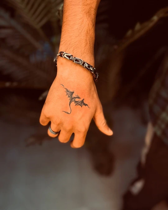 Centered Hand Dragon Motif