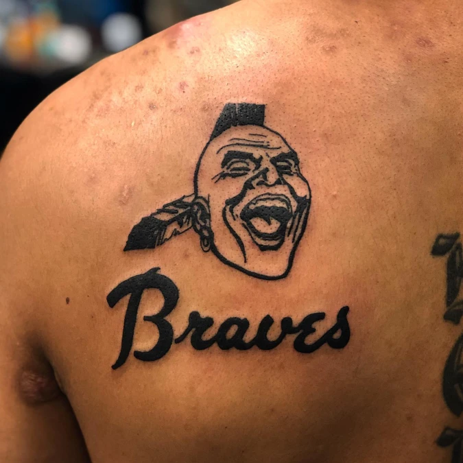 Heavy Black Mascot Logo On The Back Shoulder