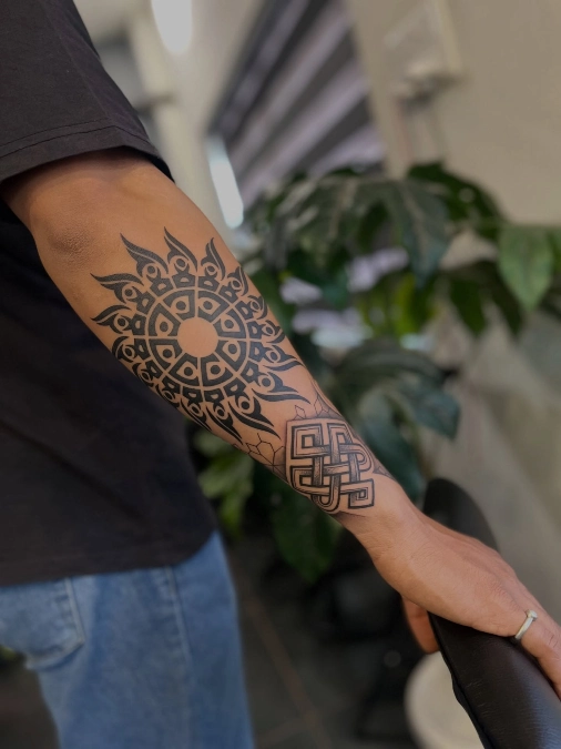 Heavy Tribal Sun And Celtic Wrist Knot