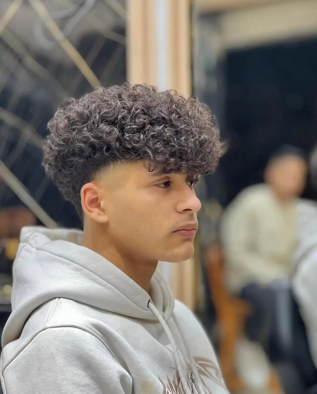 High Top Curls with a Subtle Fade