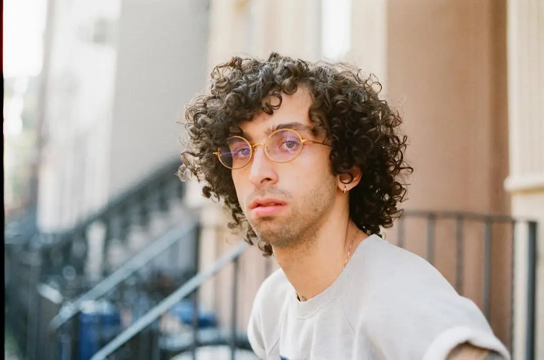 Layered Short Curls with Face-Framing