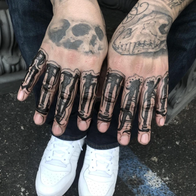 Massive Blackwork Lettering Down The Fingers