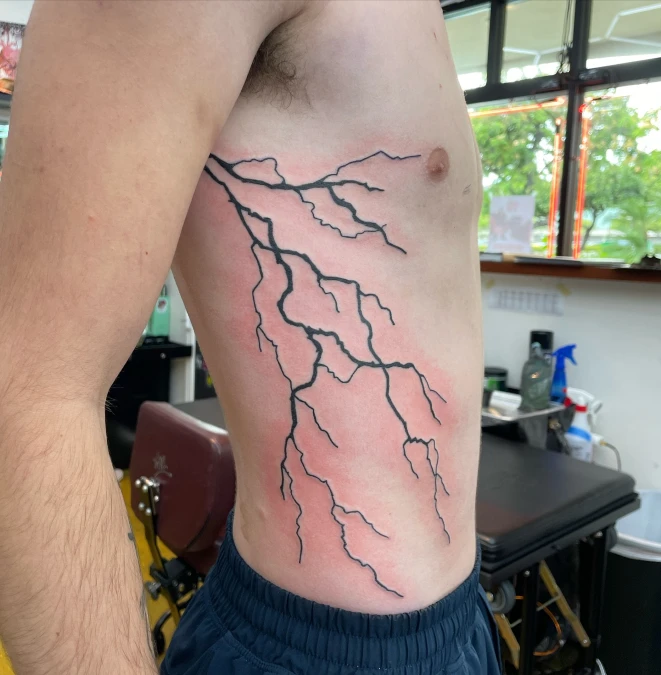 Minimalist Black Outline Lightning Bolt