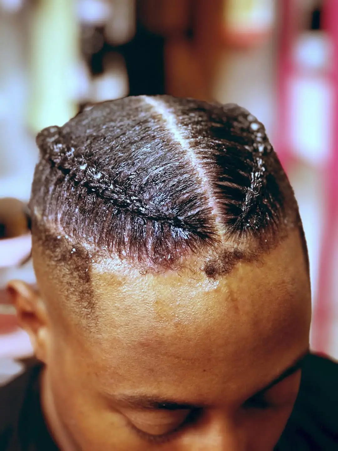 Minimalist Center-Part Cornrows