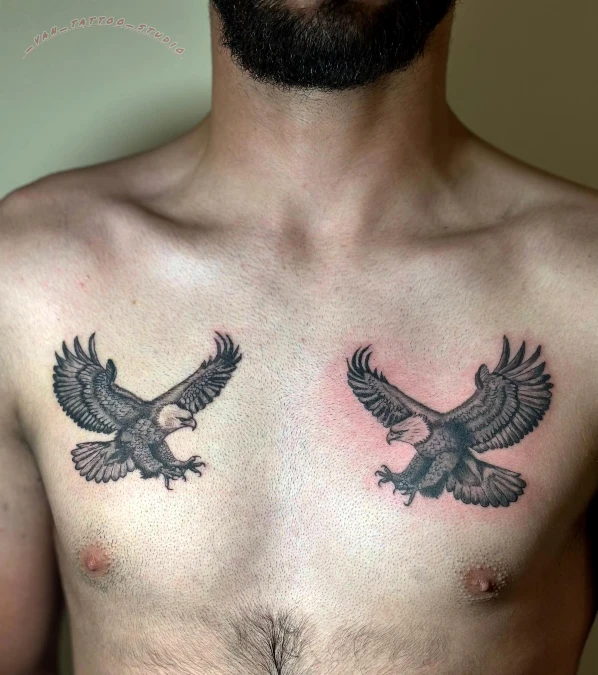 Mirrored Eagle Pair Across Both Pectorals