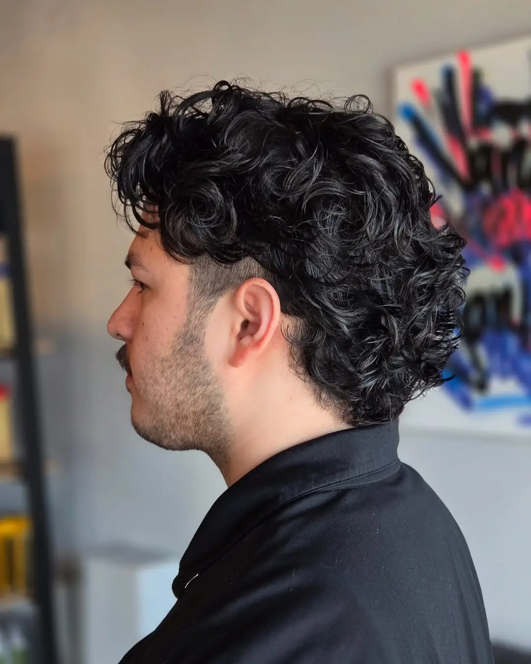 Short Shaggy Curls with Undercut Detail