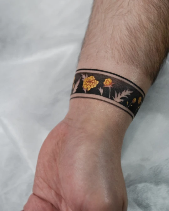 Solid Black Floral Cuff With Yellow Accents