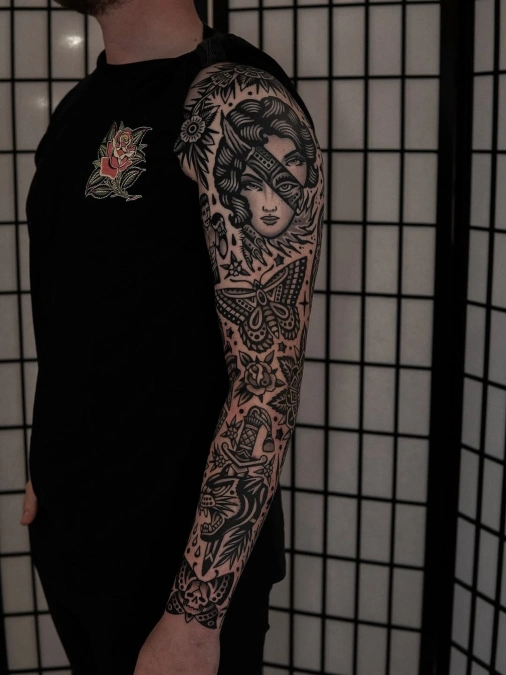 Stacked Blackwork Portraits And Dagger Motifs