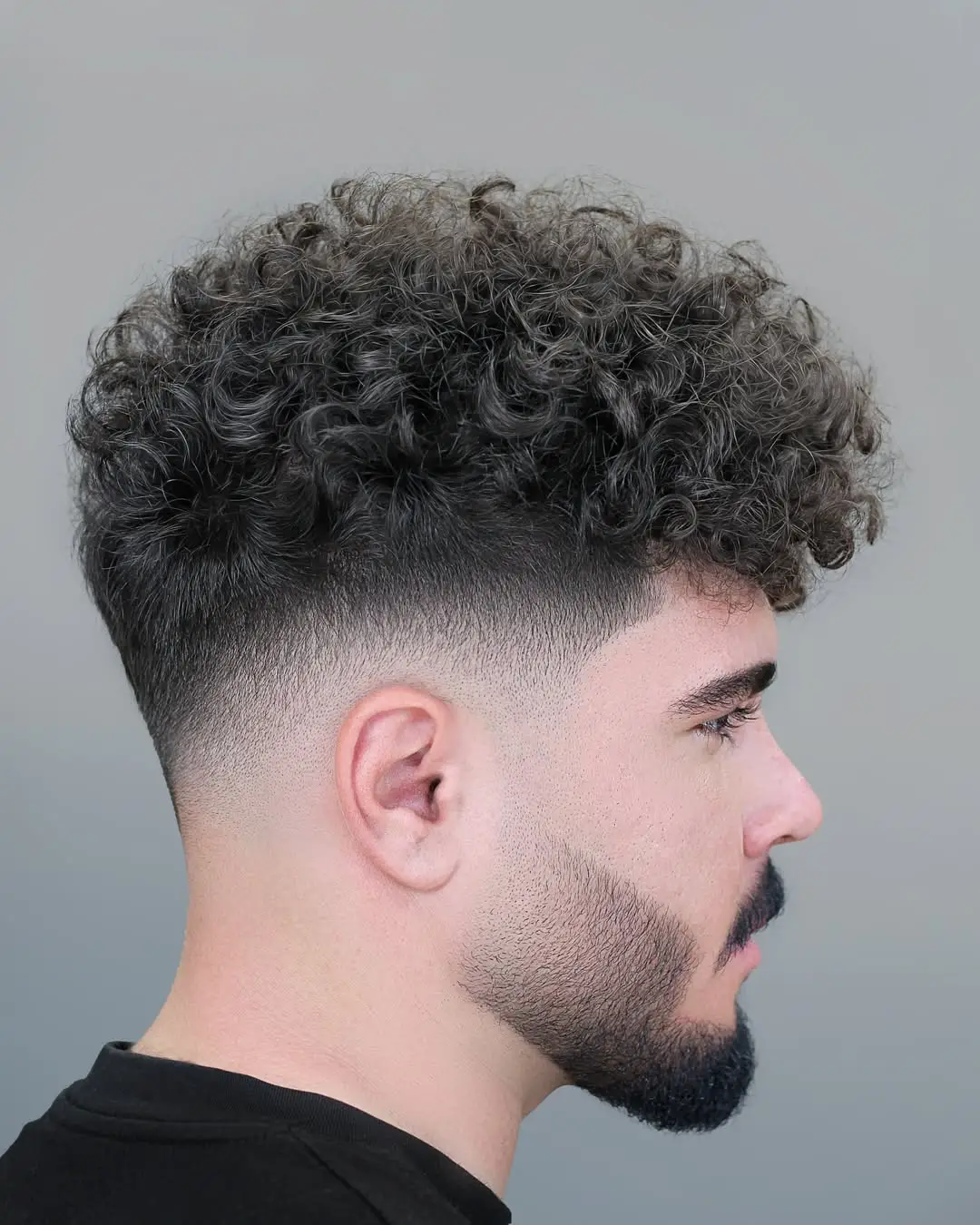 The Tapered Temple Fade with Voluminous Curls
