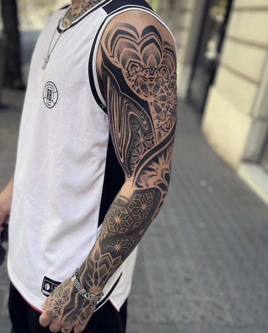 Thick Sweeping Blackwork and Hexagon Forearm Sleeve
