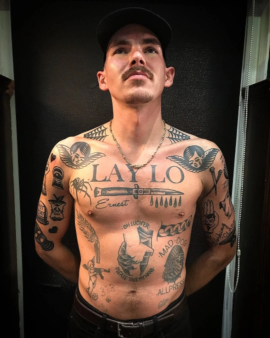 Traditional Typographic and Switchblade Chest Layout