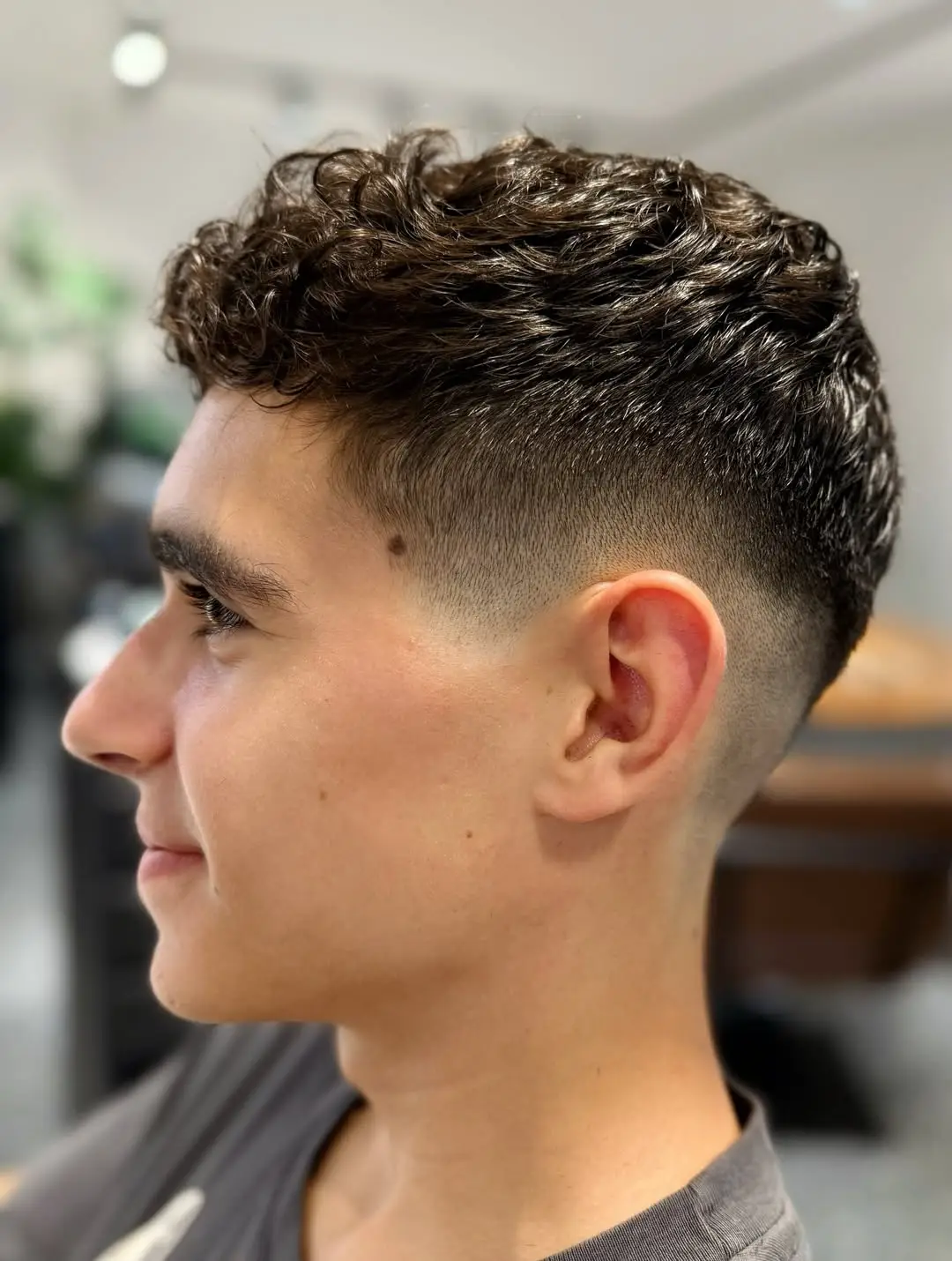 Wavy Top with Mid Skin Fade