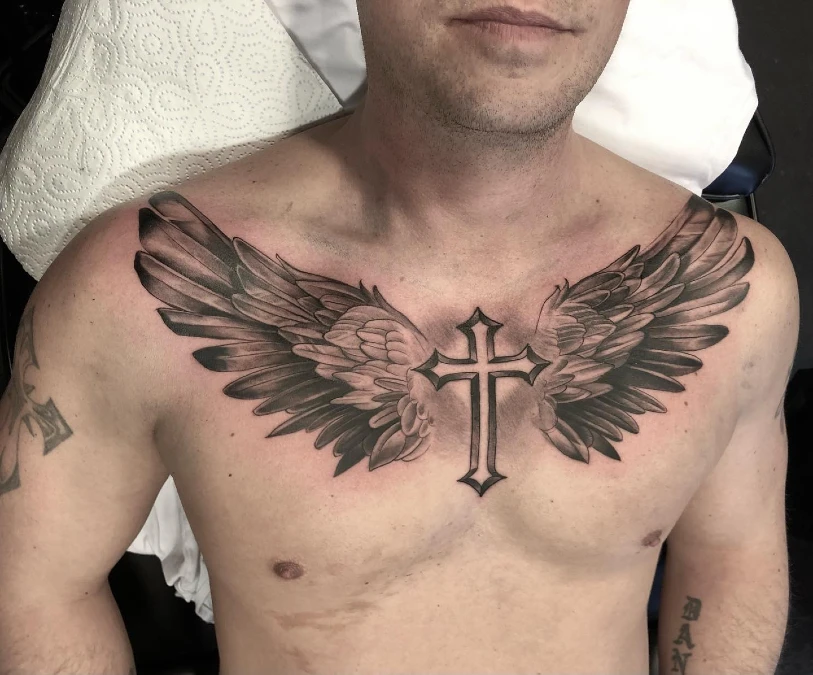Winged Cross Across the Collarbones