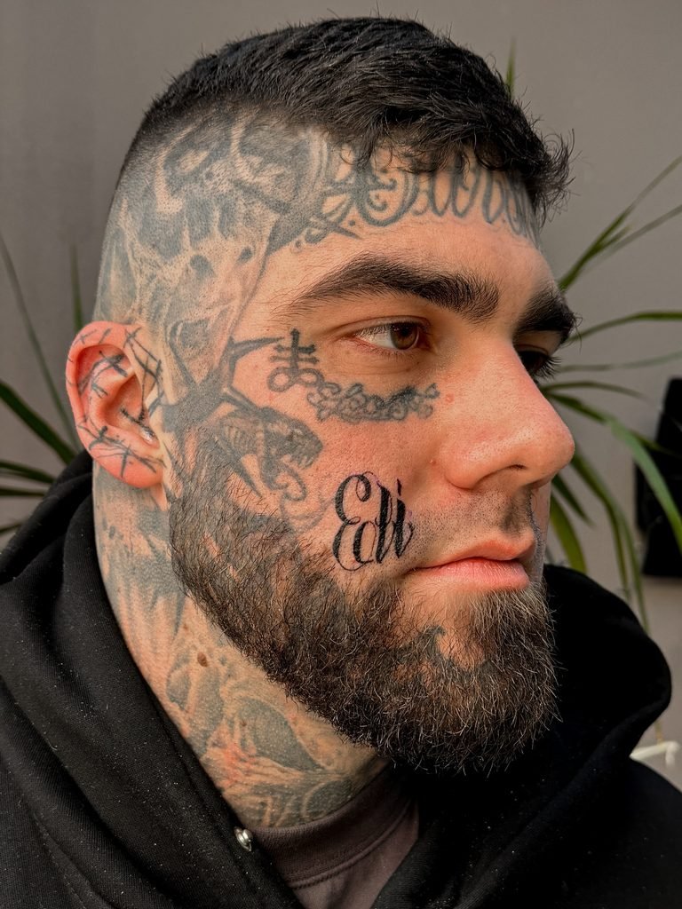High Contrast Cursive Cheek Script with Spider Shadowing