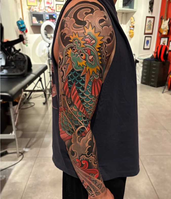 Vibrant Green Japanese Dragon Full Sleeve Tattoo