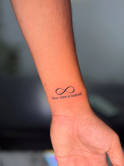 Minimalist Infinity Symbol With Typewriter Quote